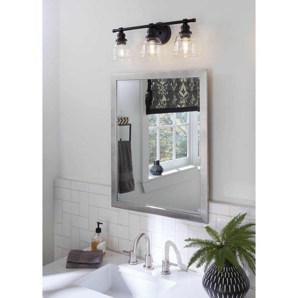 Progress Lighting Ambrose 3 light vanity wall light in bathroom setting