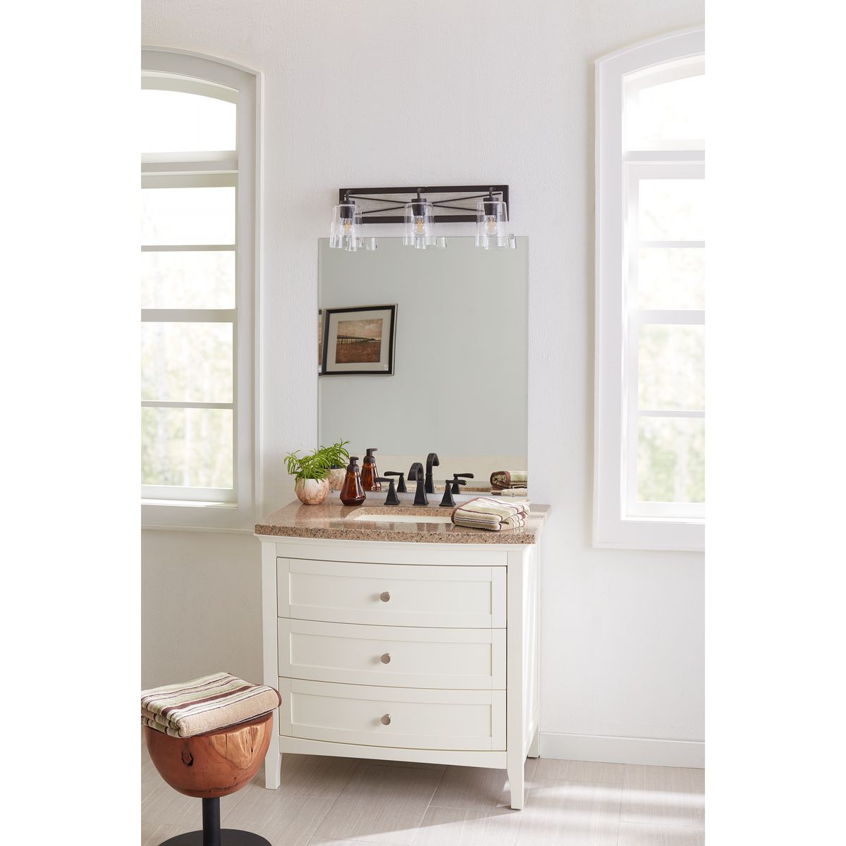 Progress Lighting Briarwood 3 light graphite bath vanity wall light installed above bathroom mirror