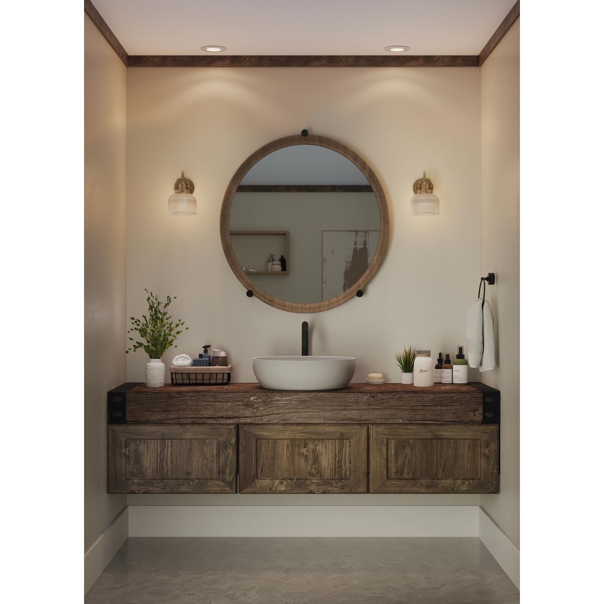 Progress Lighting Archie vintage brass bath vanity wall light installed beside bathroom mirror
