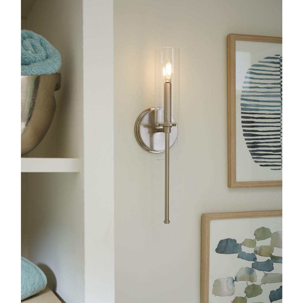Progress Lighting Elara clear glass shade accessory installed on wall light