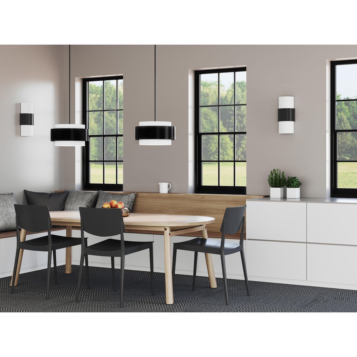 Progress Lighting Silva matte black wall sconce shown in dining room setting
