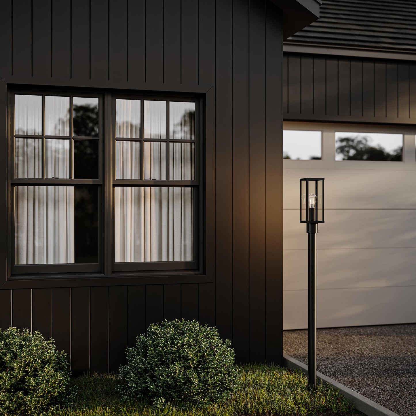 Progress Lighting P540113-31M Ryle Matte Black Outdoor Post Lantern - Nighttime Exterior Lifestyle Shot
