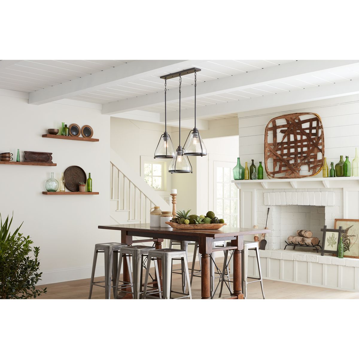 Progress Lighting Range graphite pendant shown in dining room
