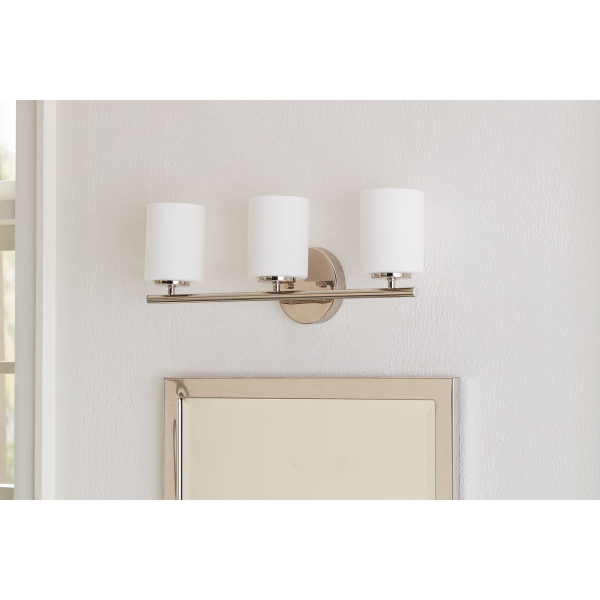 Replay polished nickel 3 light bath vanity wall light installed above mirror