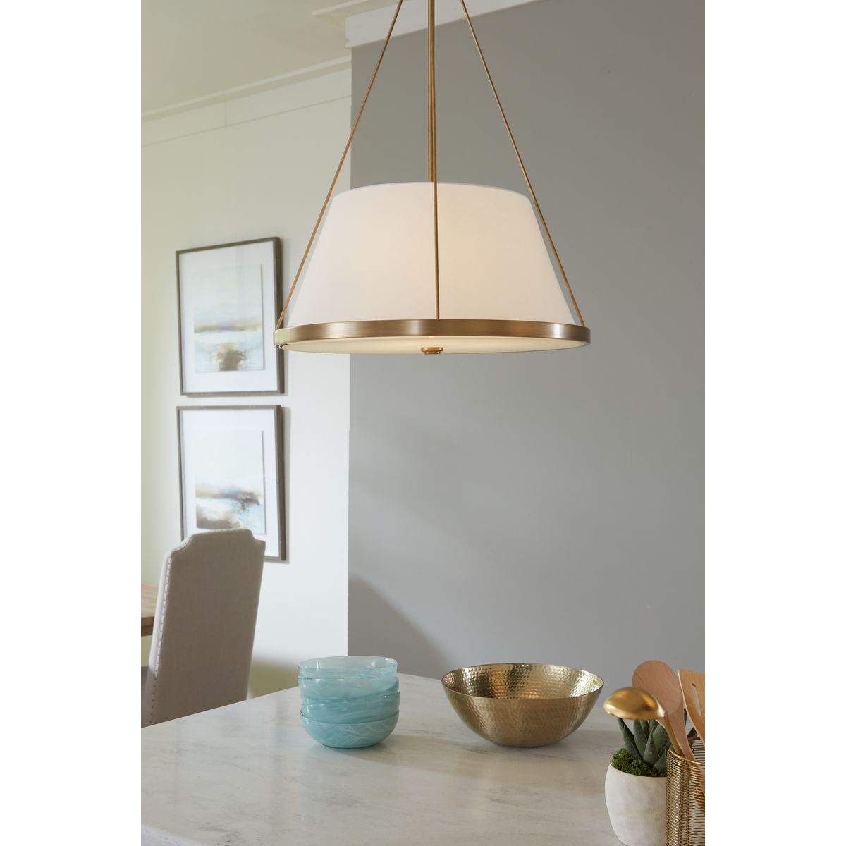 Close-up of Progress Lighting Saffert pendant in Vintage Brass