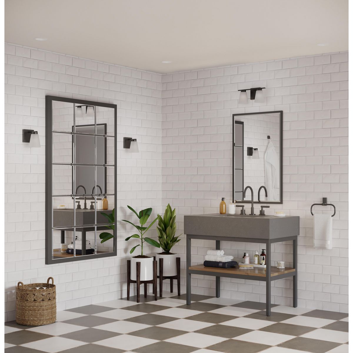 Tanner matte black bath vanity wall light in bathroom setting