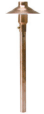 Solid copper LED area light with a natural finish, featuring a clear lens and a slim pole design for outdoor lighting.
