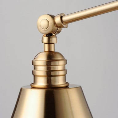 Maxim Lighting 12224HR Library Wall Sconce Heritage Brass - Close-up of upper arm pivot joint detail