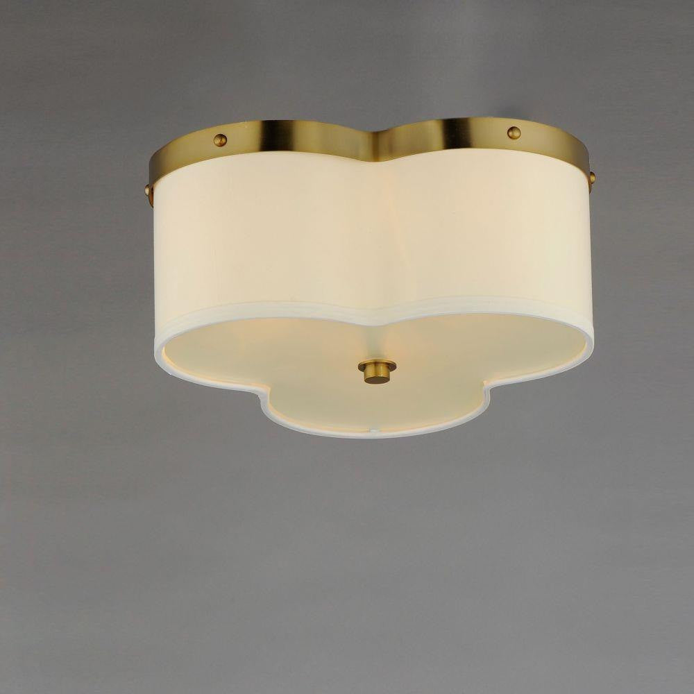 Maxim Lighting 12243OFSBR Clover Flush Mount installed on ceiling - angle view showing satin brass trim and linen shade