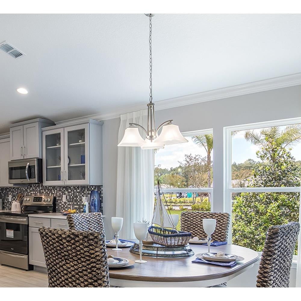Maxim Lighting Aurora 3 Light Chandelier in Satin Nickel installed in a dining area