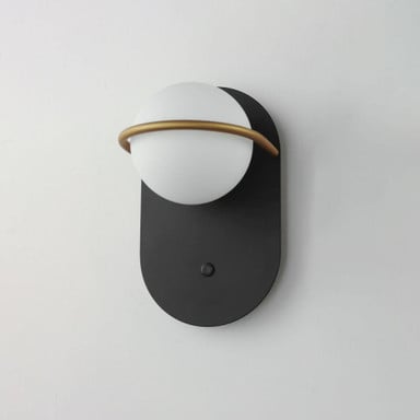 Maxim Lighting 21600SWBKGLD Revolve Wall Sconce Angle View on Wall