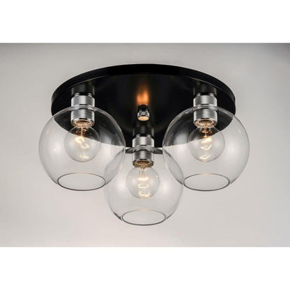 Maxim Lighting 21610CLBKAL Vessel 3 Light Flush Mount showing illuminated clear glass spheres on black round canopy