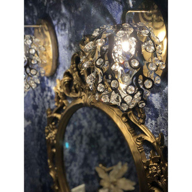 Maxim Lighting 24202BCPC Comet Wall Sconce lifestyle setting close-up with illuminated crystals