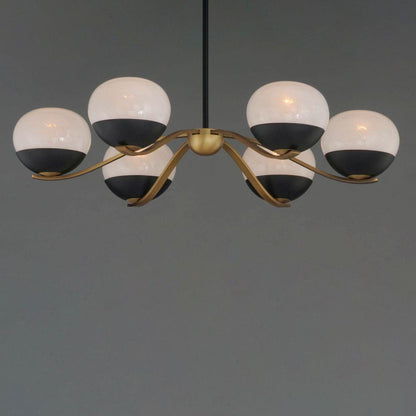 Maxim Lighting 24646MRBKNAB Lucerne 6 Light Chandelier close-up showing marble glass globes and curved brass arms on dark background