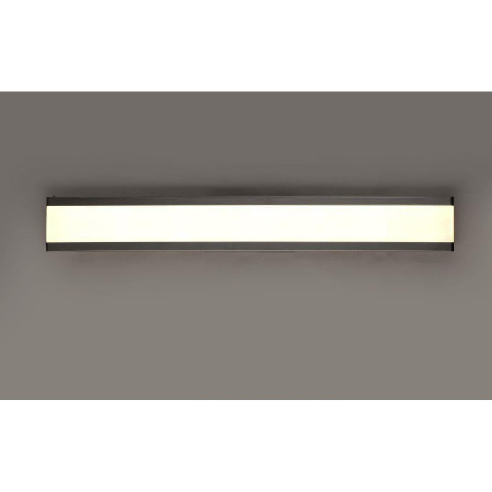 Maxim Lighting 24758FTBK Visor LED Bath Vanity Wall Light illuminated on dark background