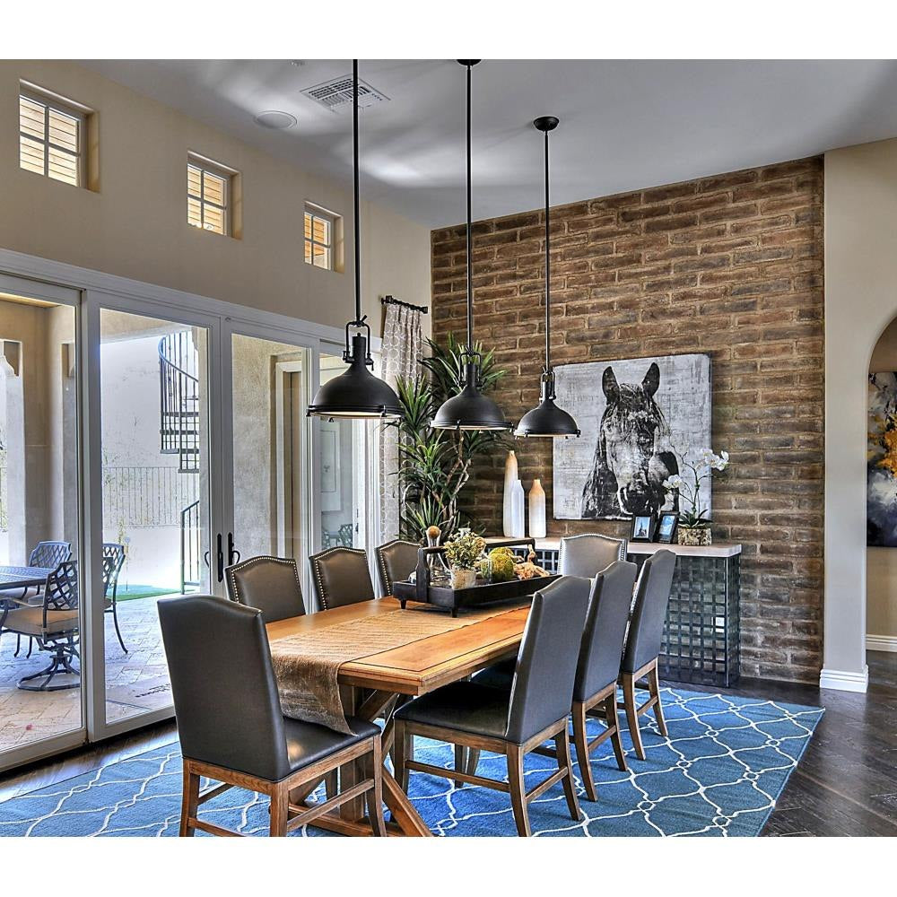 Maxim Lighting 25109FTBZ Hi Bay Bronze Pendant Ceiling Light installed over dining table in lifestyle setting