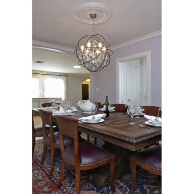 Maxim Lighting 25144ARPN Orbit 6 Light Chandelier installed over dining table lifestyle view