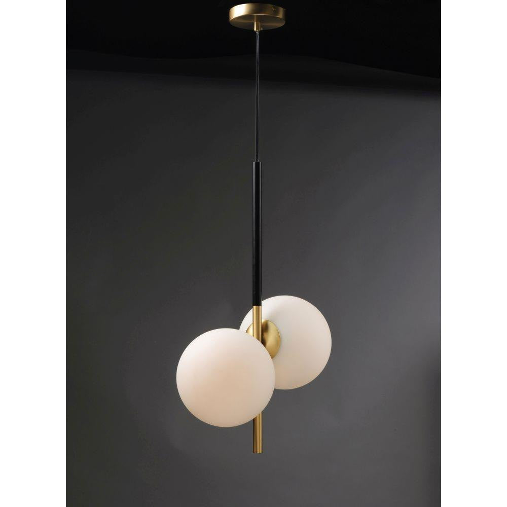 Maxim Lighting 26035SWSBRBK Vesper 2 Light Pendant illuminated with glowing white glass globe shades on dark background