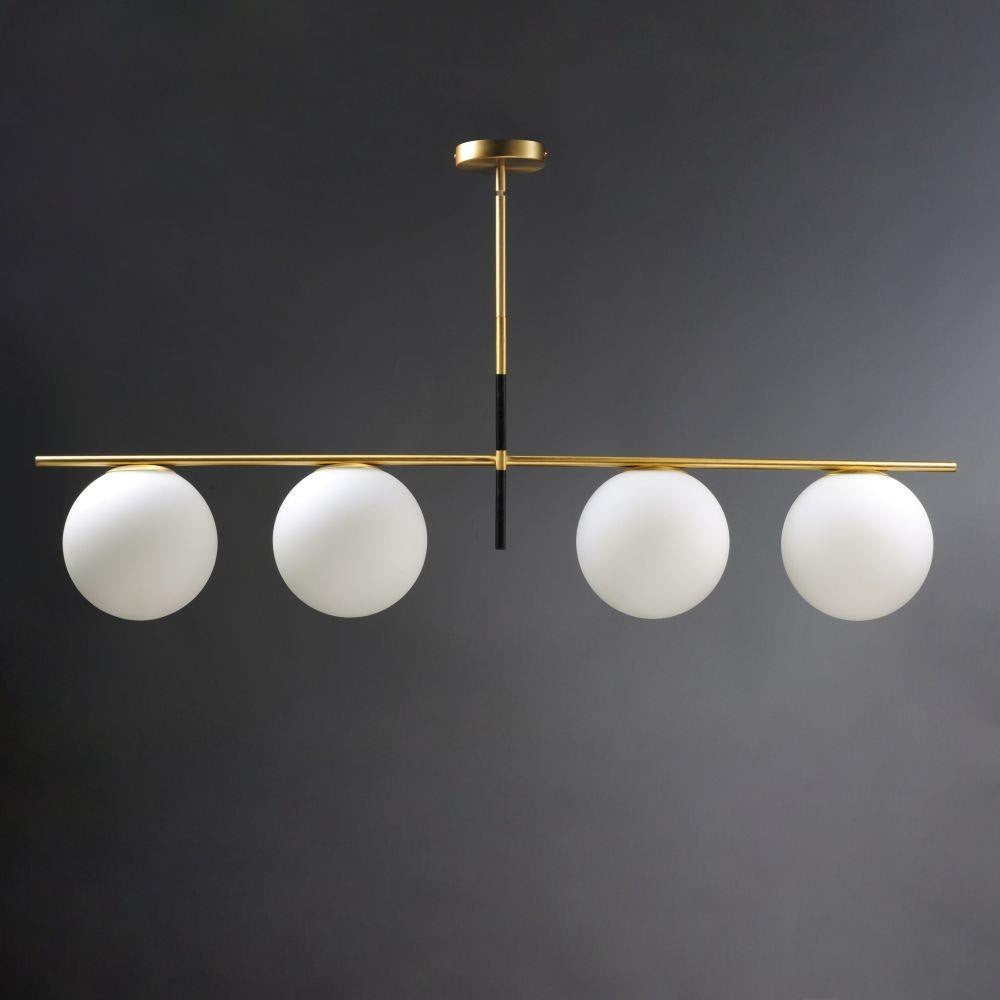 Maxim Lighting 26036SWSBRBK Vesper 4 Light Satin Brass Black Linear Pendant with Satin White Glass Globes Front View Dark Background
