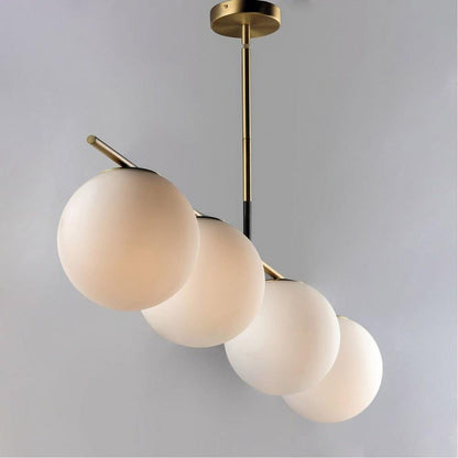 Maxim Lighting 26036SWSBRBK Vesper 4 Light Satin Brass Black Linear Pendant Close-Up Detail of Glass Globes
