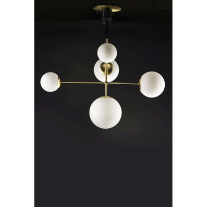 Maxim Lighting 26037SWSBRBK Vesper 5 Light Pendant illuminated against dark background showing warm glow