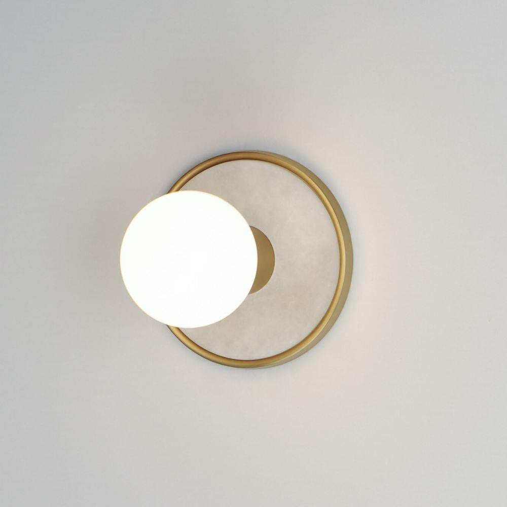 Maxim Lighting 26091WANAB Hollywood Bath Vanity Wall Light illuminated on wall - side angle view