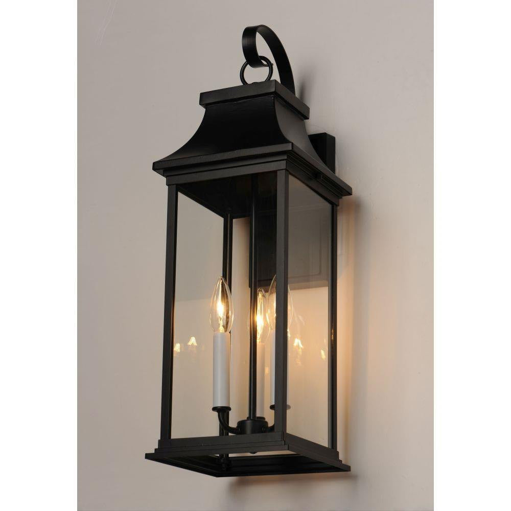 Maxim Lighting 30024CLBK Vicksburg 3 Light Black Outdoor Wall Sconce - Angle View Illuminated