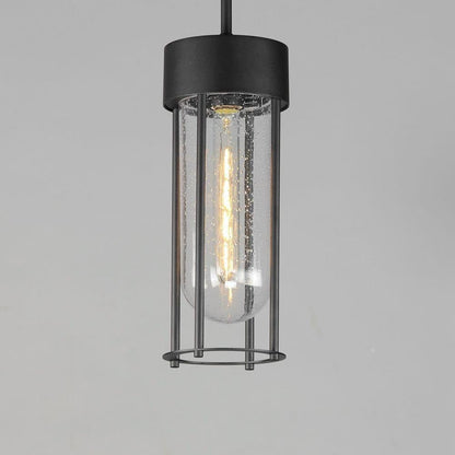 Maxim Lighting 30587CDBK Millennial 1 Light Matte Black Outdoor Mini Pendant - Angled close-up view with illuminated filament bulb visible through seeded clear glass
