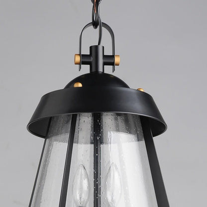 Maxim Lighting 30623CDBKAB Mariner Outdoor Pendant Detail of Black and Antique Brass Top Cap and Seedy Glass