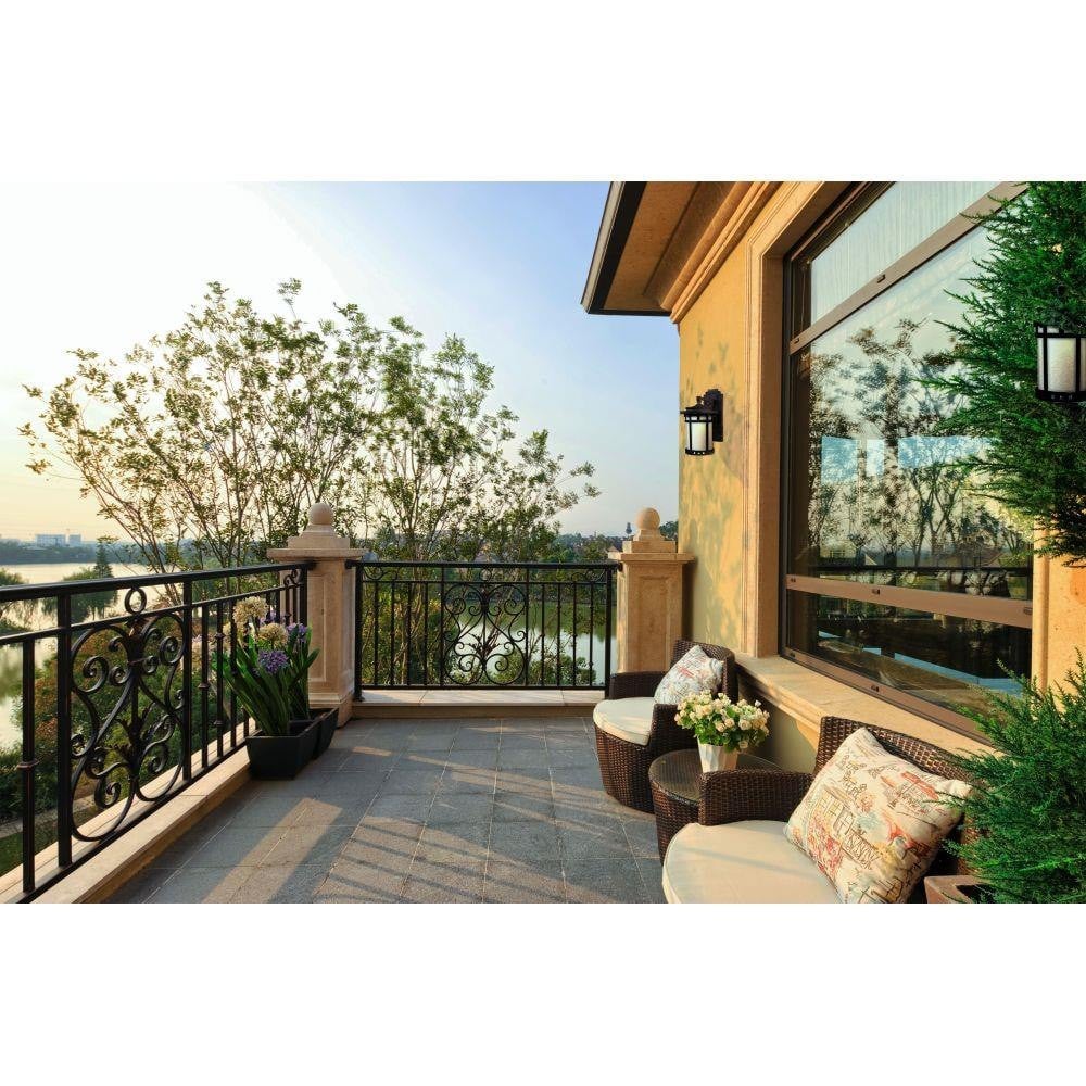 Maxim Lighting 3144MOSE Santa Barbara Dark Sky Outdoor Wall Lantern shown installed on an exterior balcony wall