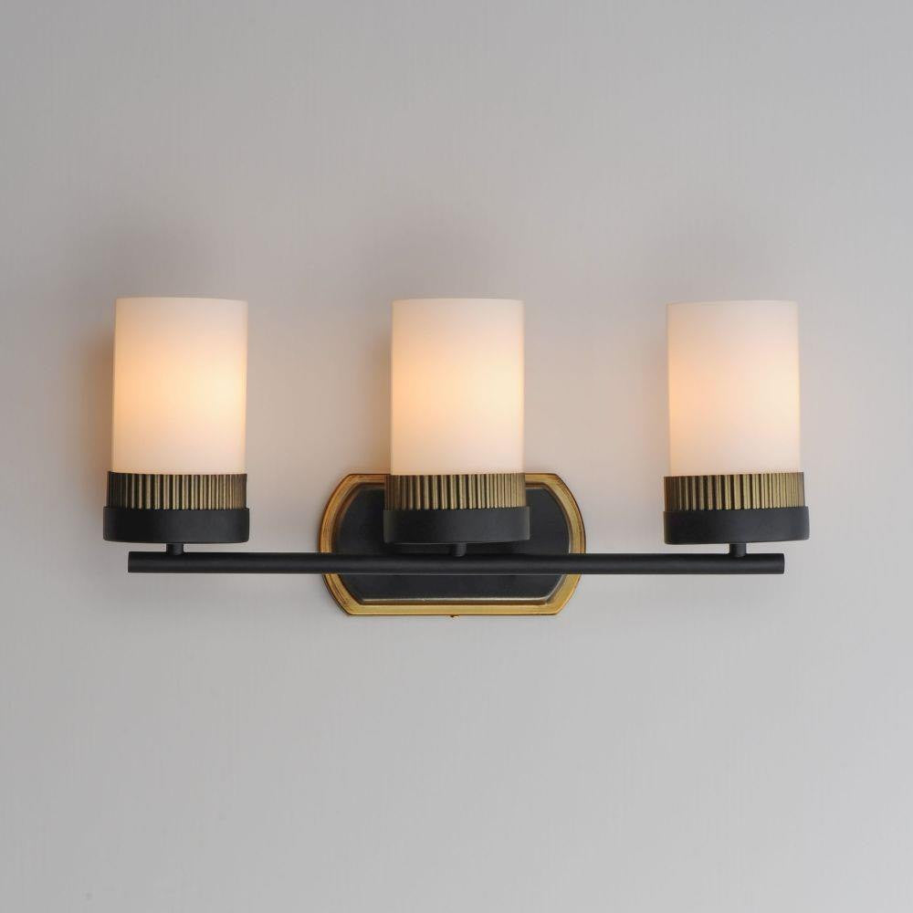 Maxim Lighting 32652SWBKAB Ruffles 3 Light Bath Vanity Wall Light in Black with Antique Brass - angle view on gray background