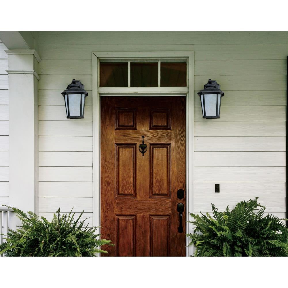 Maxim Lighting 3342WFBO Radcliffe Outdoor Wall Lantern shown installed flanking a front door