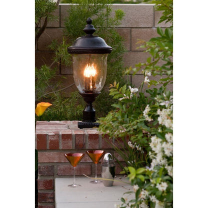 Maxim Lighting Carriage House DC collection Oriental Bronze outdoor lantern lifestyle shot in garden setting