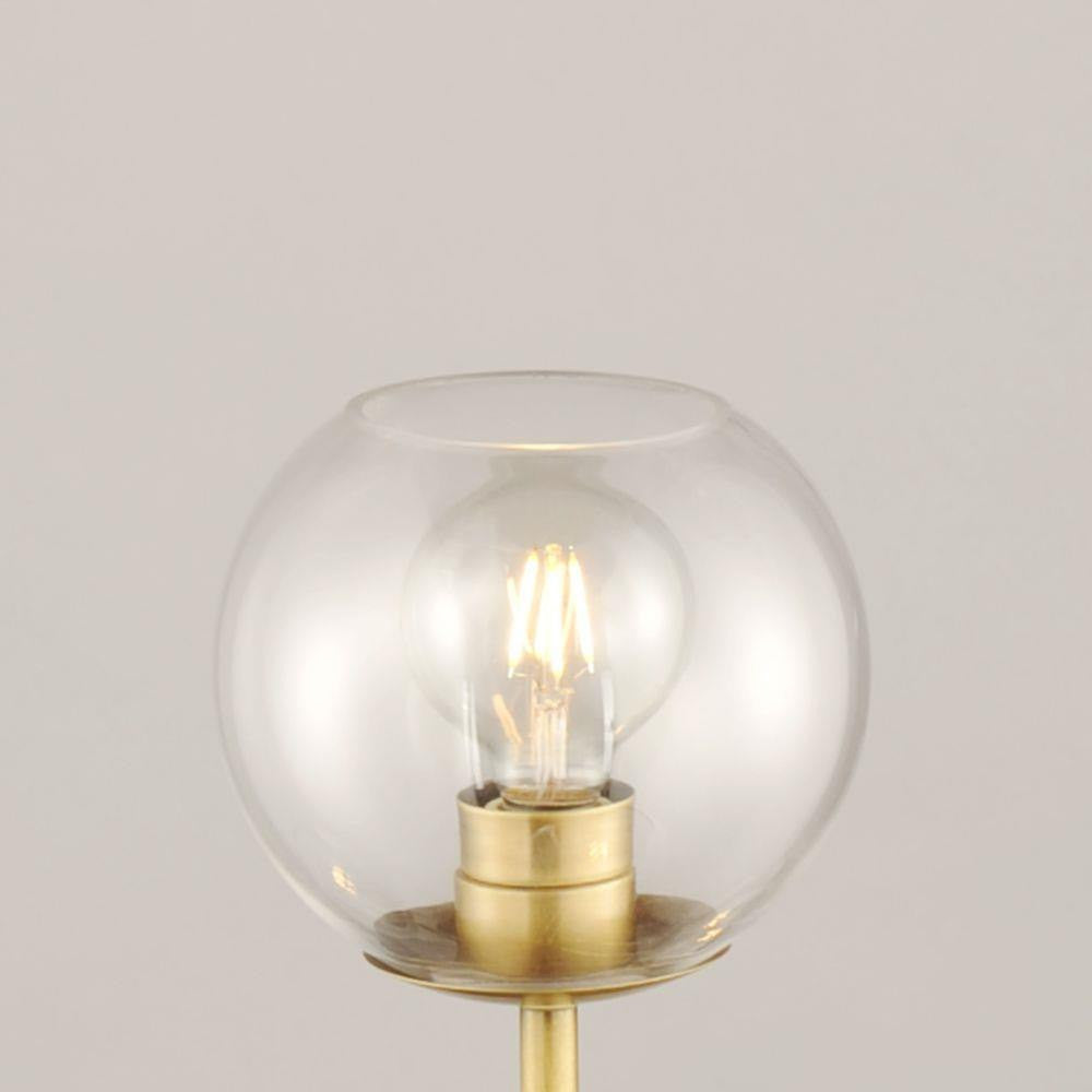 Close-Up of Clear Globe Shade Detail on Maxim Lighting 38412CLNAB Branch Bath Vanity Wall Light
