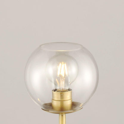 Close-Up of Clear Globe Shade Detail on Maxim Lighting 38412CLNAB Branch Bath Vanity Wall Light