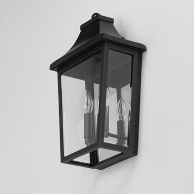 Maxim Lighting 40231CLBK Sutton Place Vx Black Outdoor Wall Lantern angle view showing clear glass and black frame