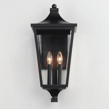 Maxim Lighting 40235CLBK Sutton Place VX Black Outdoor Wall Lantern Illuminated View