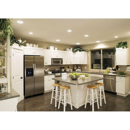 Maxim Lighting 57663WTBK Trim LED Flush Mount installed in a kitchen ceiling with warm white light