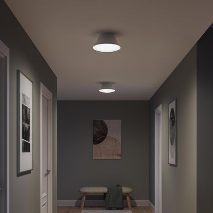 Progress Lighting P350305-009 Avra Flush Mount in Brushed Nickel installed in a hallway - nighttime lifestyle view