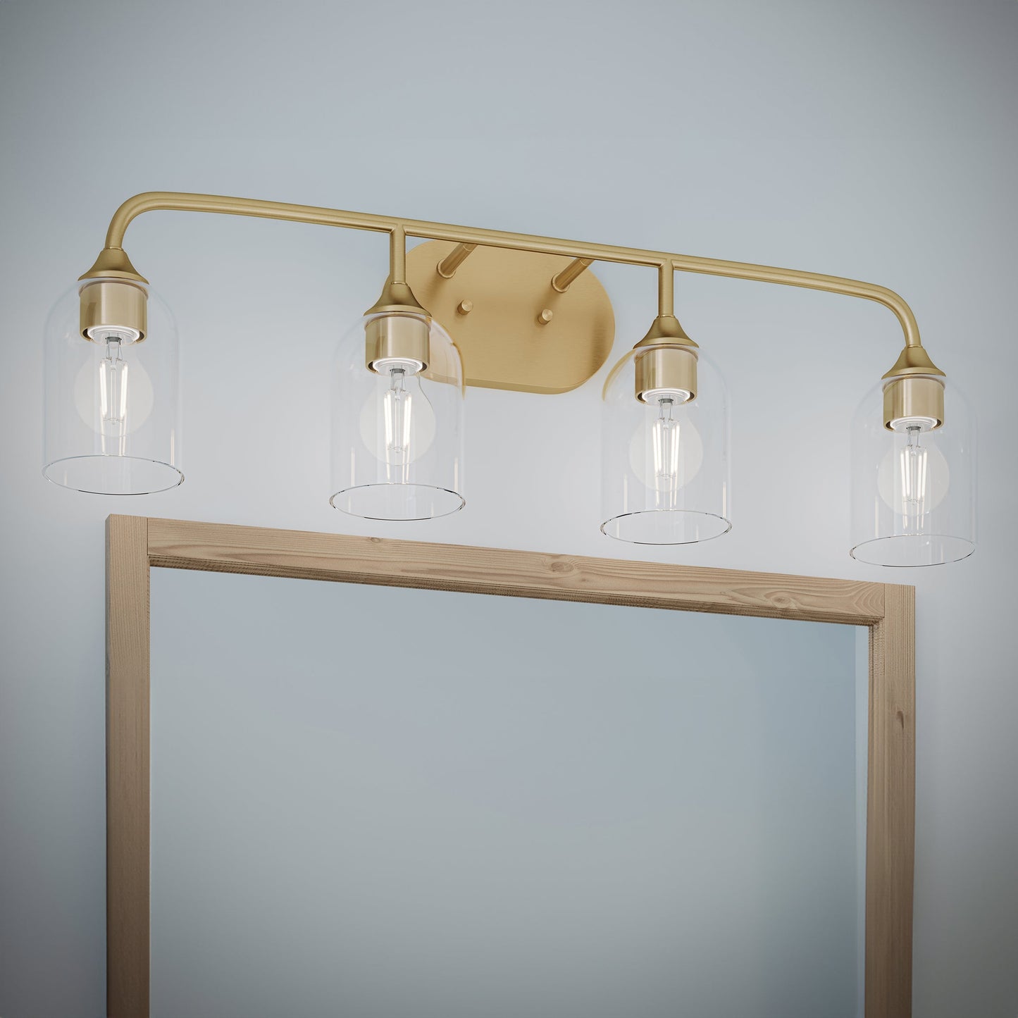 Progress Lighting P300574-191 Ilia Brushed Gold Bath Vanity Wall Light Installed Above Mirror