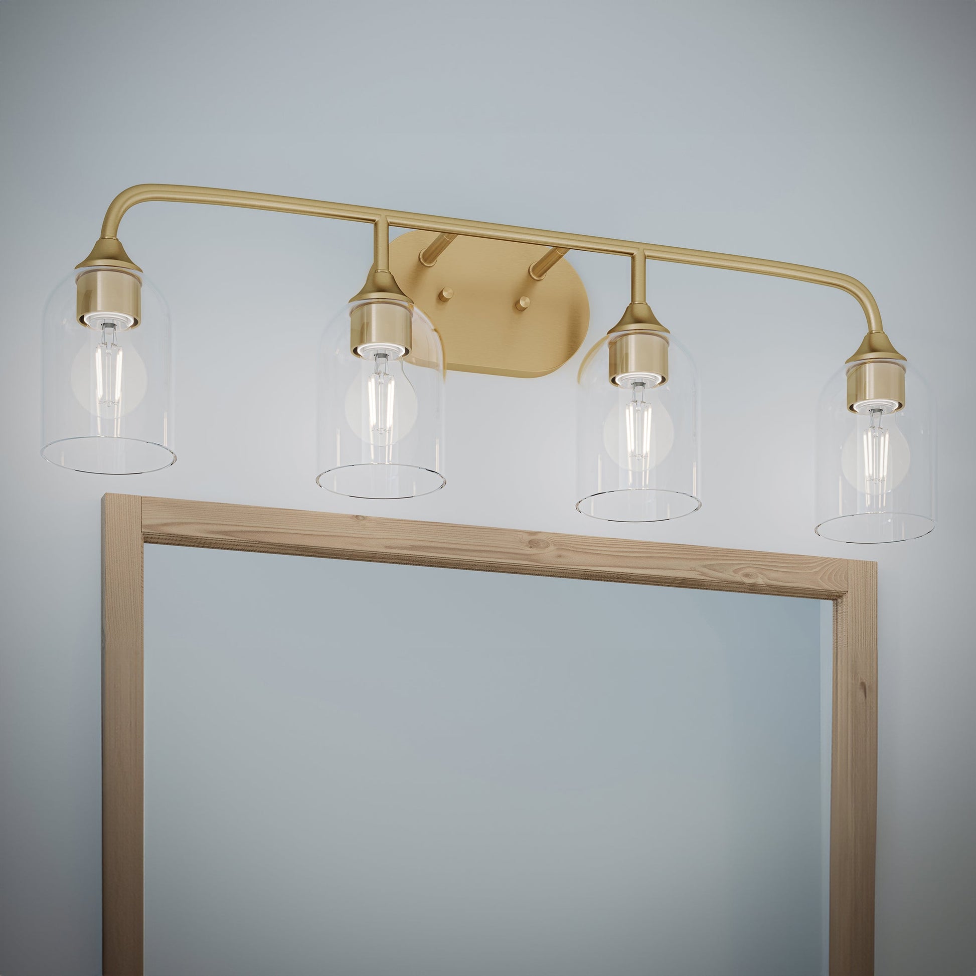 Progress Lighting P300574-191 Ilia Brushed Gold Bath Vanity Wall Light Installed Above Mirror
