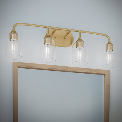 Progress Lighting P300574-191 Ilia Brushed Gold Bath Vanity Wall Light Installed Above Mirror