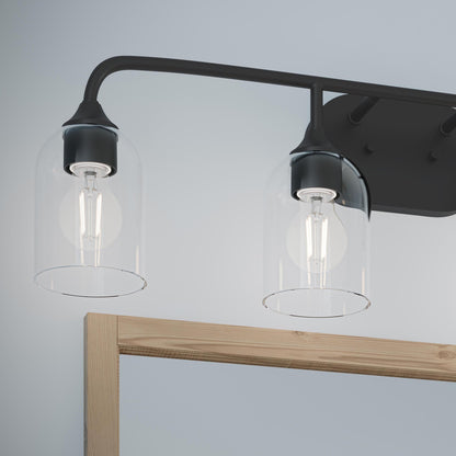 Progress Lighting P300574-31M Ilia 4-Light Matte Black Bath Vanity close-up detail with shades facing down