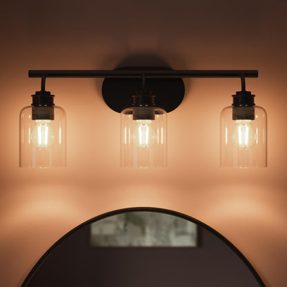 Progress Lighting P300567-31M Reines 3 Light Matte Black Bath Vanity Wall Light - Detail View Illuminated