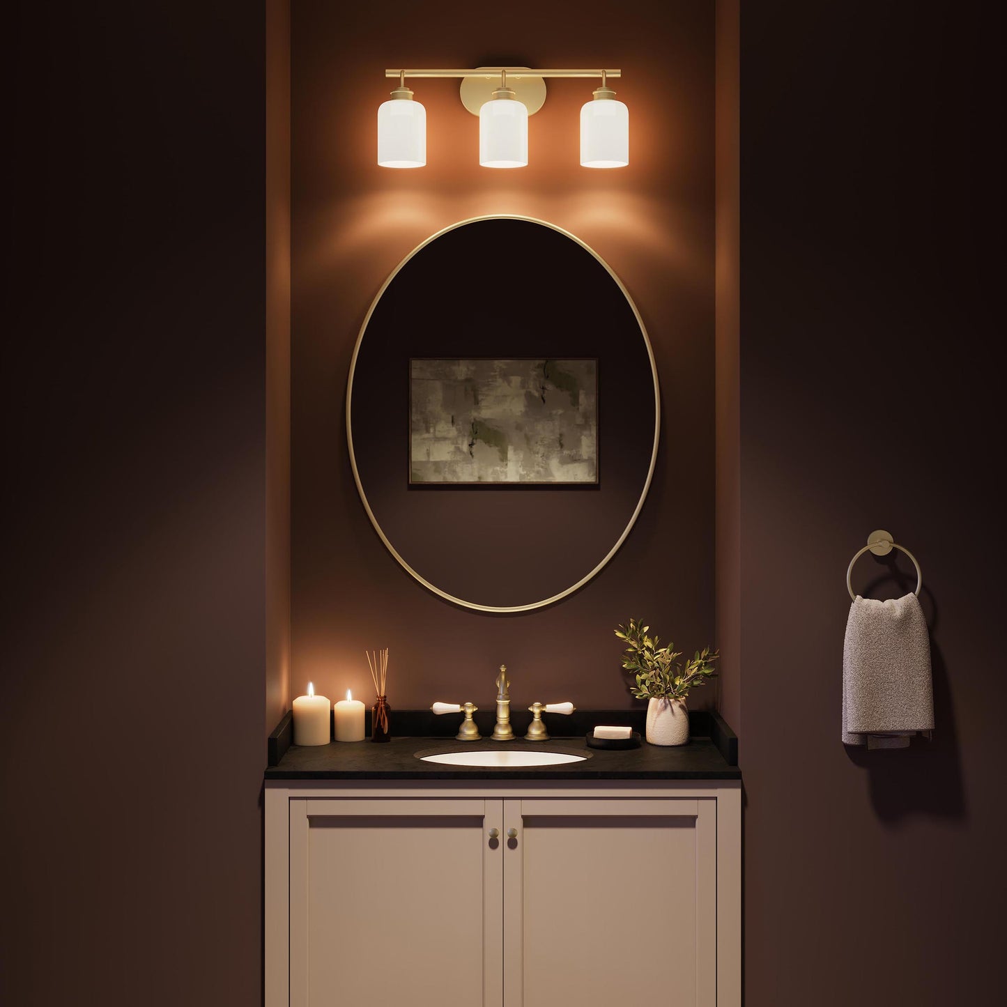 Progress Lighting Reines P300579-191 Brushed Gold Bath Vanity illuminated above bathroom mirror - Night Scene
