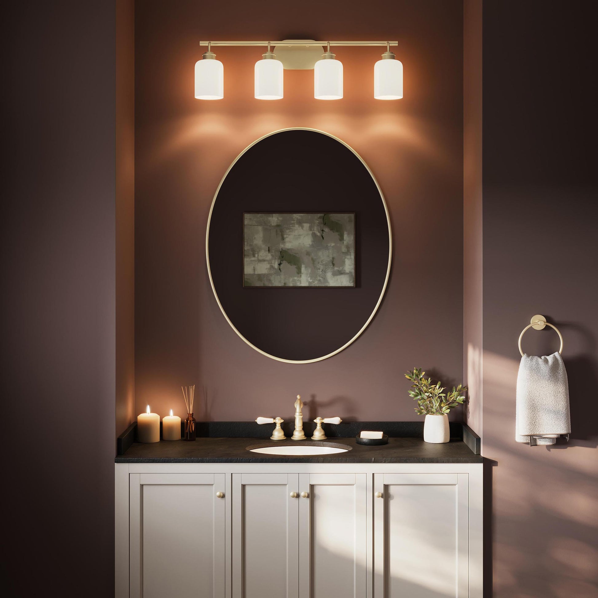 Progress Lighting Reines P300580-191 Brushed Gold Bath Vanity Light installed above bathroom mirror lifestyle shot