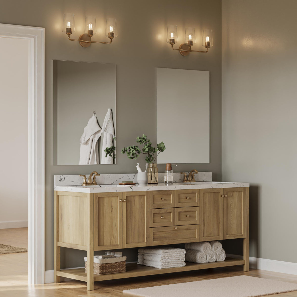 Progress Lighting Celino 3 light bath vanity wall light installed above bathroom mirrors