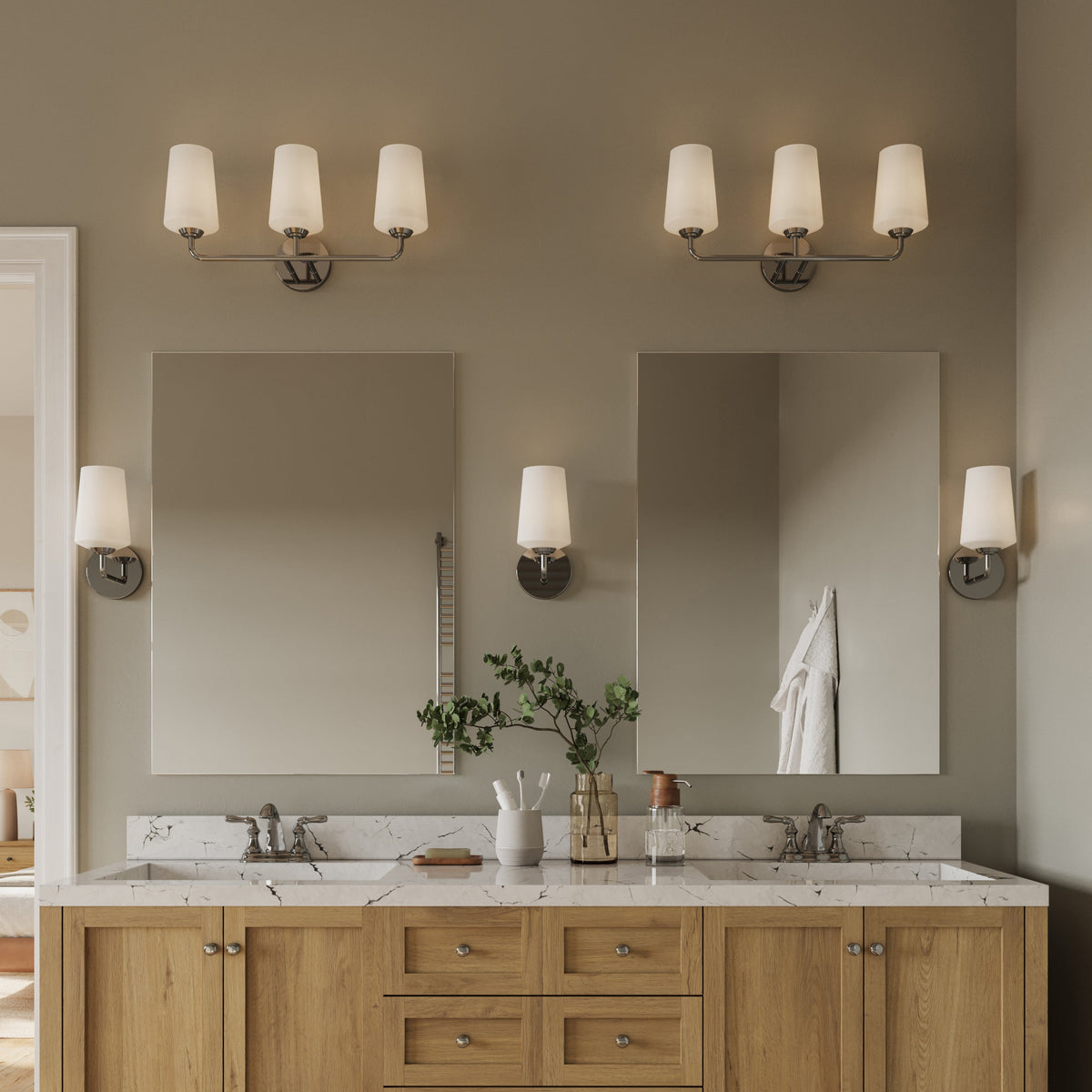 Progress Lighting Celino polished chrome bath vanity wall light in bathroom setting