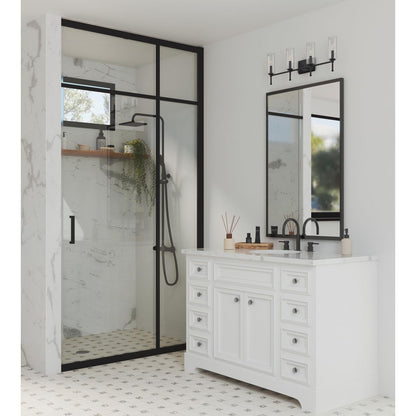 Progress Lighting Elara matte black 4 light bath vanity wall light in bathroom setting