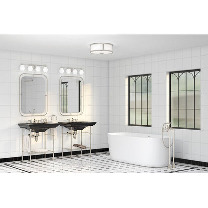 Copeland 4 light brushed nickel bath vanity wall light in bathroom setting